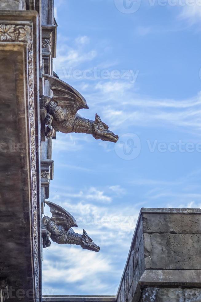 Antiquity in detail. Decoration of houses, balconies, windows, sculptures, walls. Elements of architectural design of buildings. Old plaster, Stone decorations. Elements of Gothic architecture photo