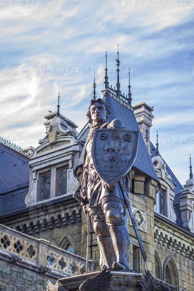 Antiquity in detail. Decoration of houses, balconies, windows, sculptures, walls. Elements of architectural design of buildings. Old plaster, Stone decorations. Elements of Gothic architecture photo