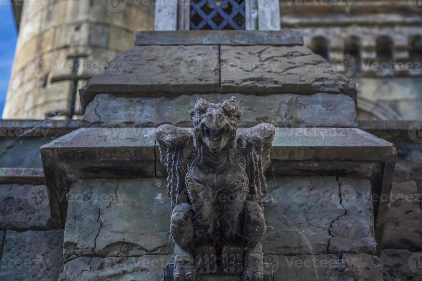 Antiquity in detail. Decoration of houses, balconies, windows, sculptures, walls. Elements of architectural design of buildings. Old plaster, Stone decorations. Elements of Gothic architecture photo