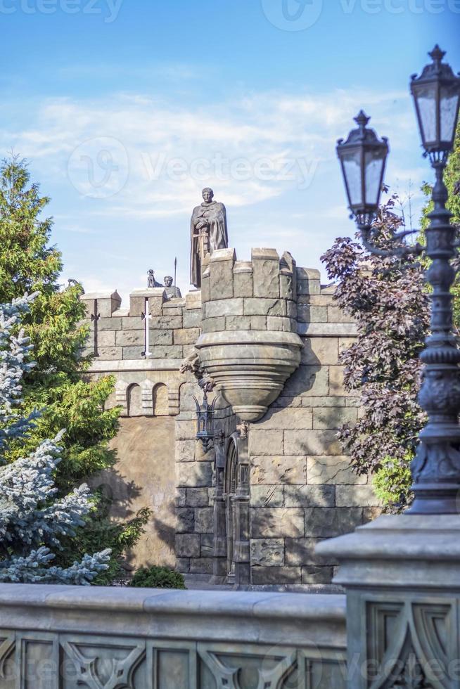 Antiquity in detail. Decoration of houses, balconies, windows, sculptures, walls. Elements of architectural design of buildings. Old plaster, Stone decorations. Elements of Gothic architecture photo