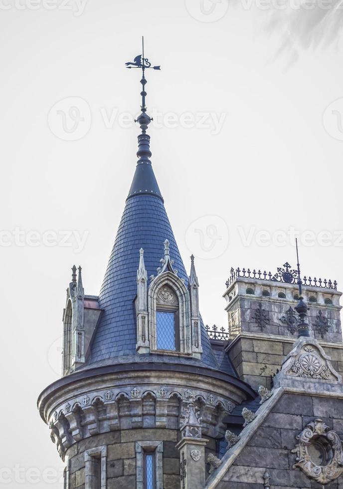 Antiquity in detail. Decoration of houses, balconies, windows, sculptures, walls. Elements of architectural design of buildings. Old plaster, Stone decorations. Elements of Gothic architecture photo