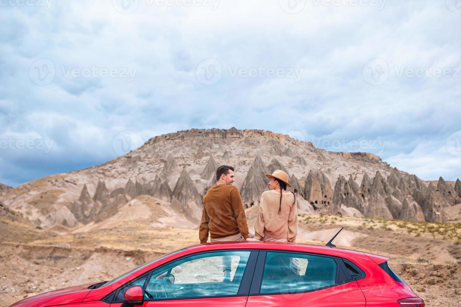 Happy couple on summer vacation in famous place. Cave formations. photo