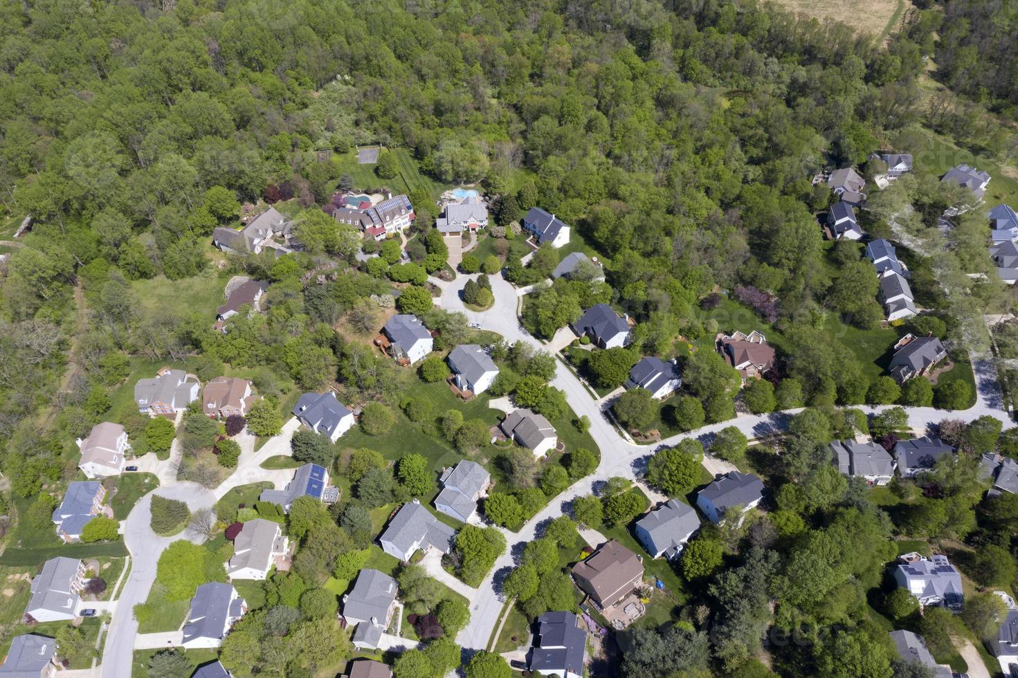 upper middle class american neighborhood with curving street in Maryland photo