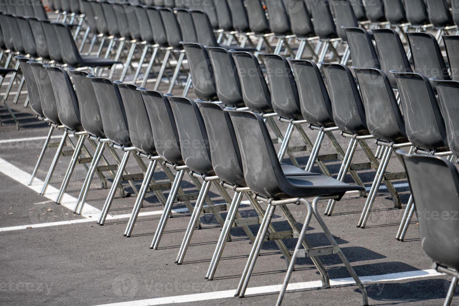 Many empty chairs without audience photo