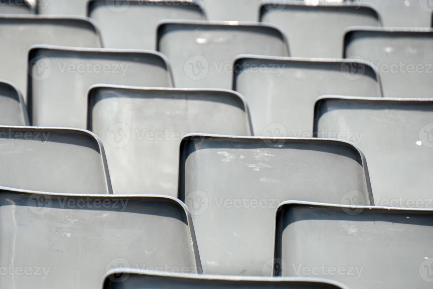 Many empty chairs without audience photo