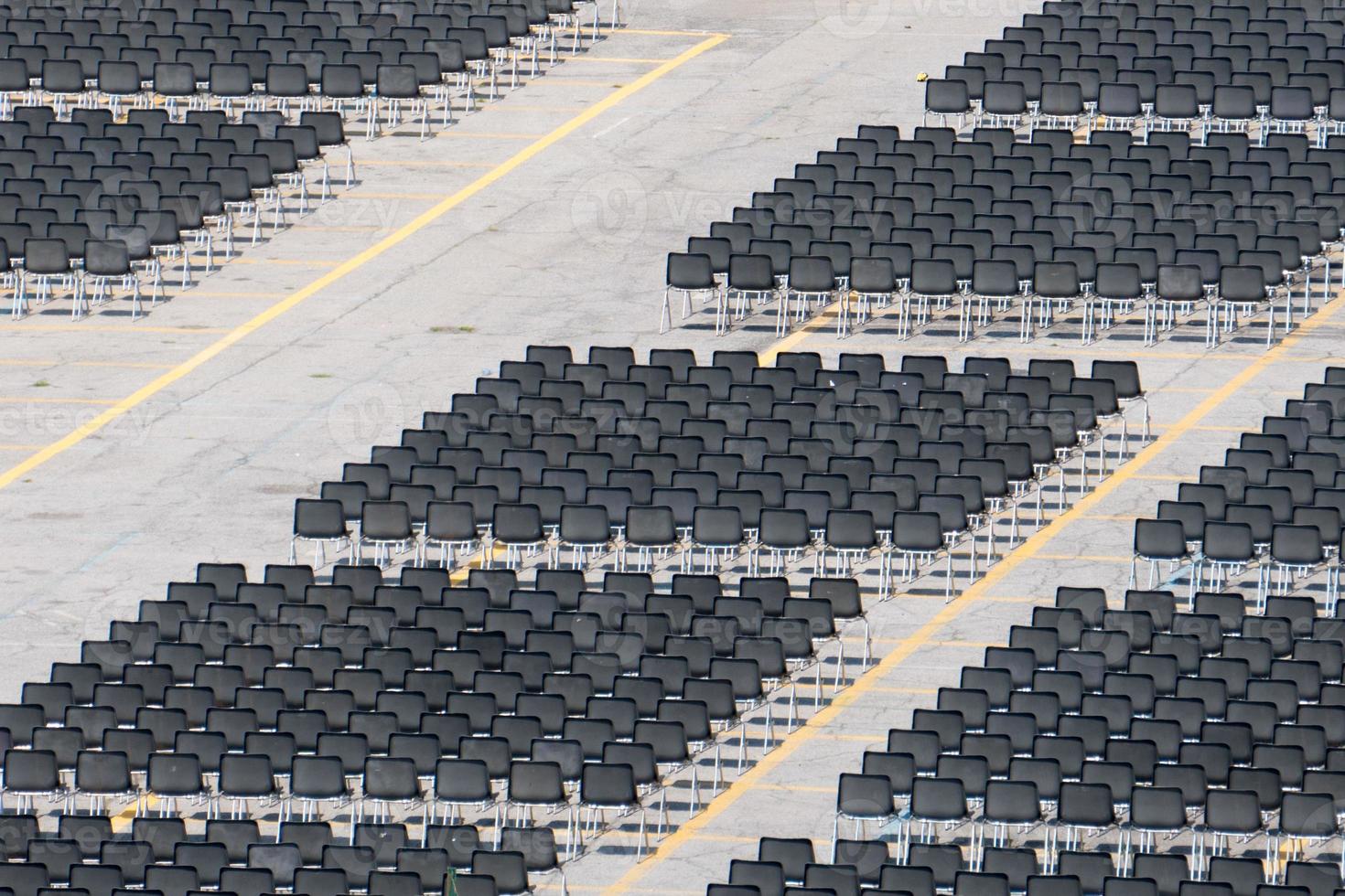 Many empty chairs without audience photo