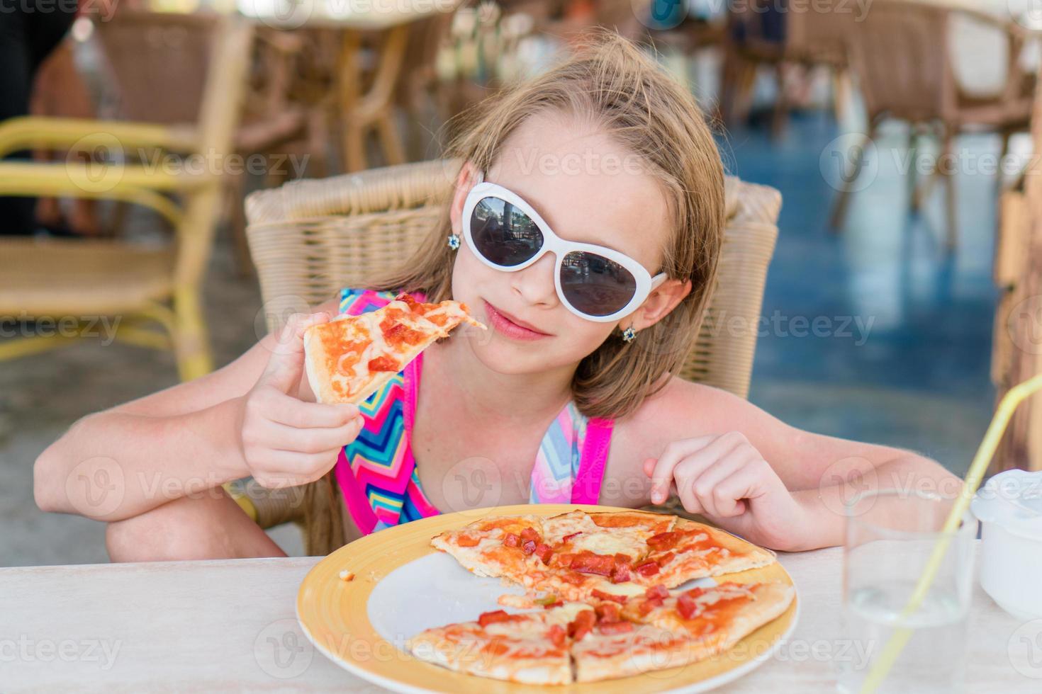 Adorable little girl eating pizza for lunch 18832319 Stock Photo at ...