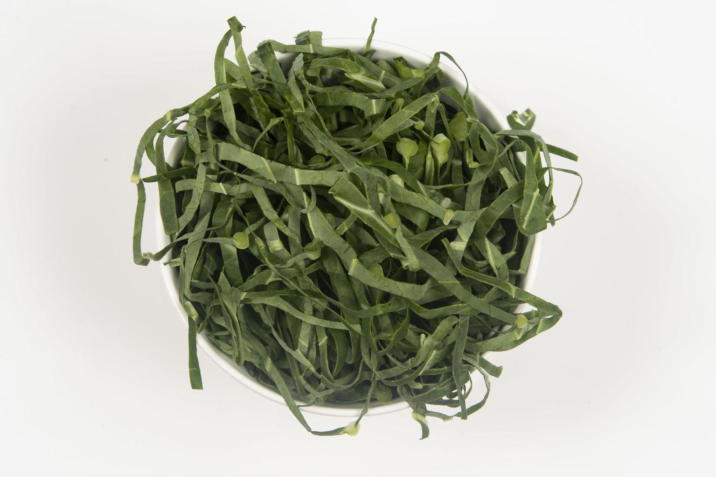 cabbage chopped into strips in pot isolated, photo