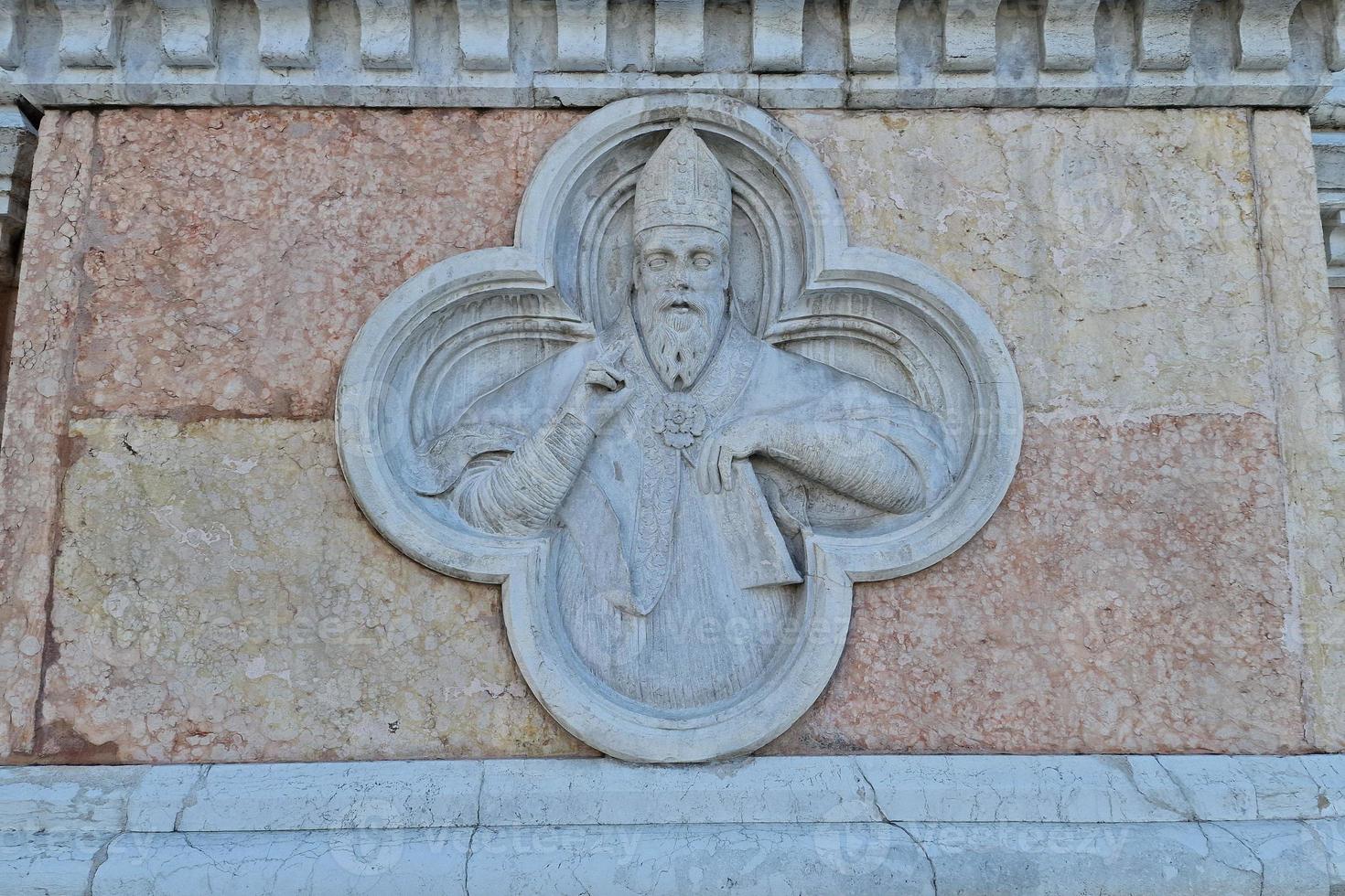 bologna piazza maggiore church san petronio bas relief photo