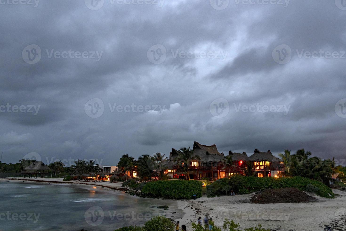 sunset in tulum mexico photo