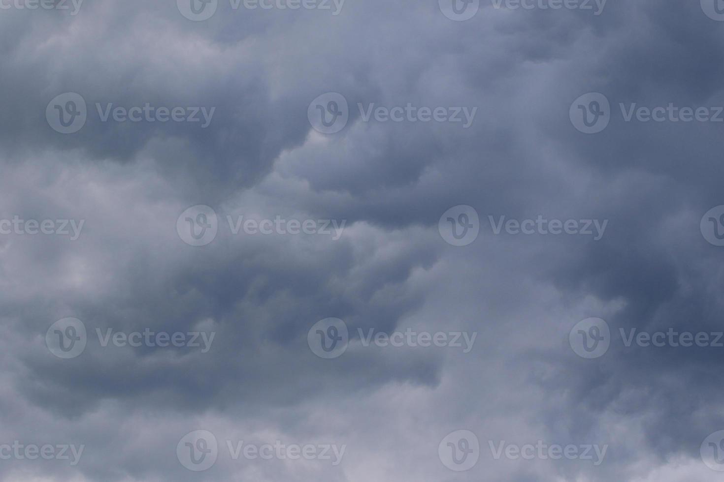 Stormy weather and dark clouds photo
