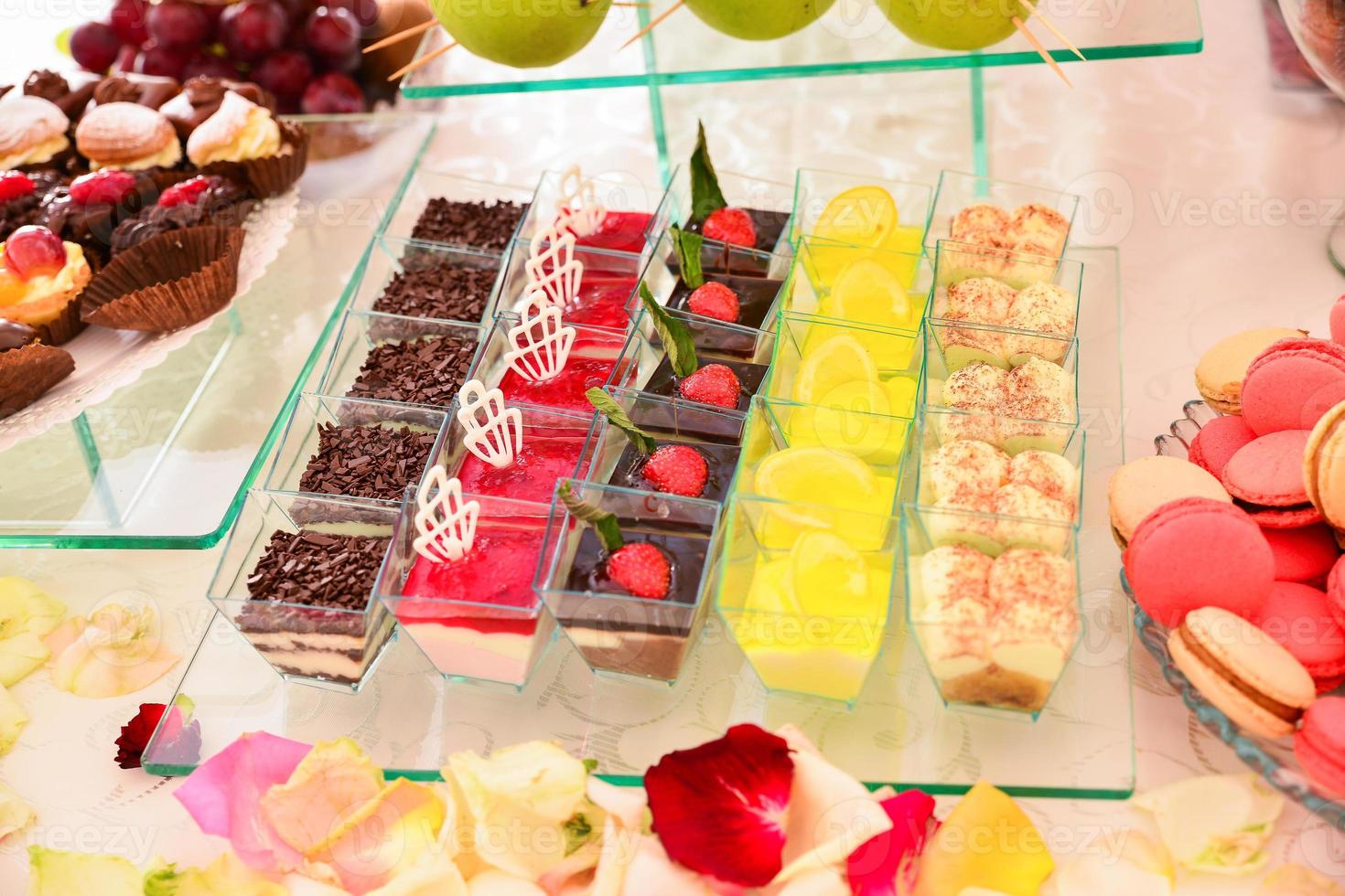 Delicious sweets arranged on the table for events reception photo