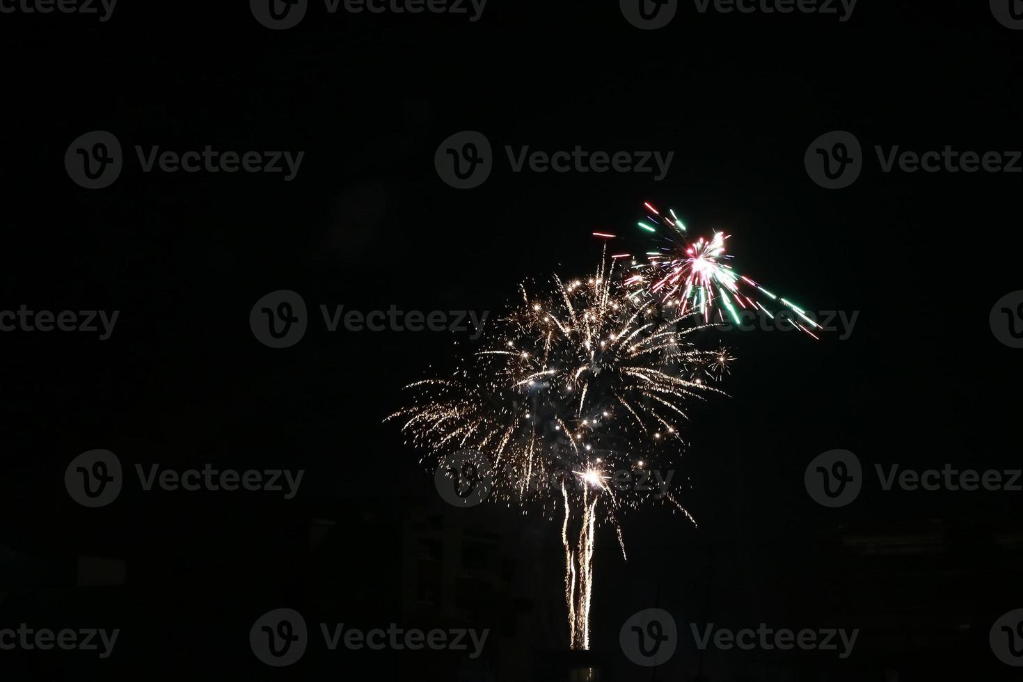 Colorful fireworks on the black sky photo