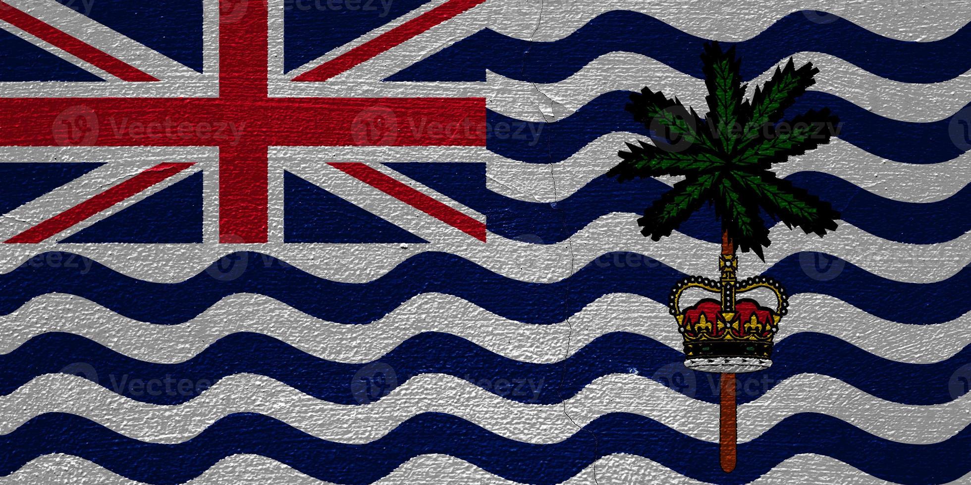 Flag of the British Overseas Territory of British Indian Ocean Territory on a textured background. Concept collage. photo