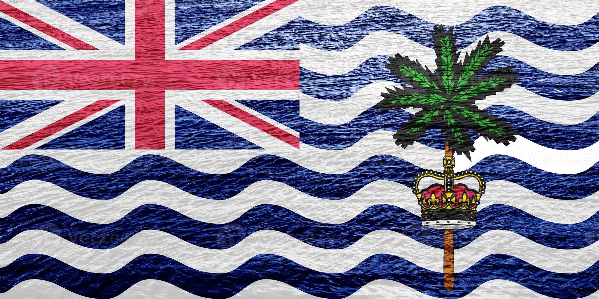Flag of the British Overseas Territory of British Indian Ocean Territory on a textured background. Concept collage. photo