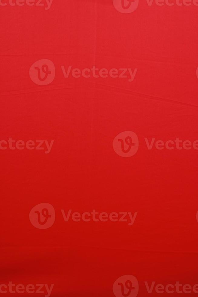 Red fabric cloth polyester texture and textile background. photo