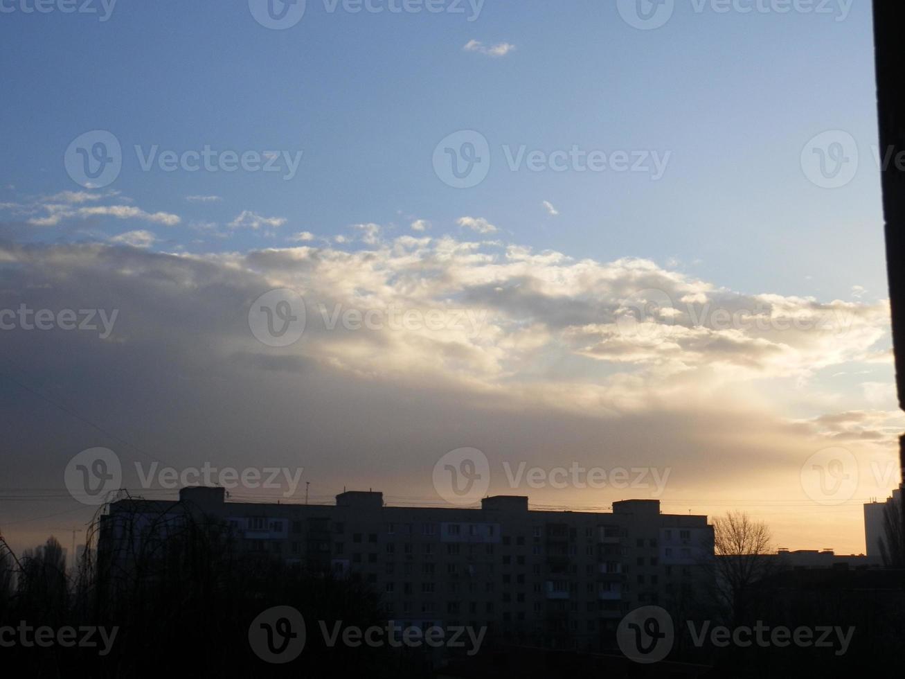 Morning winter fog hangs over the city photo