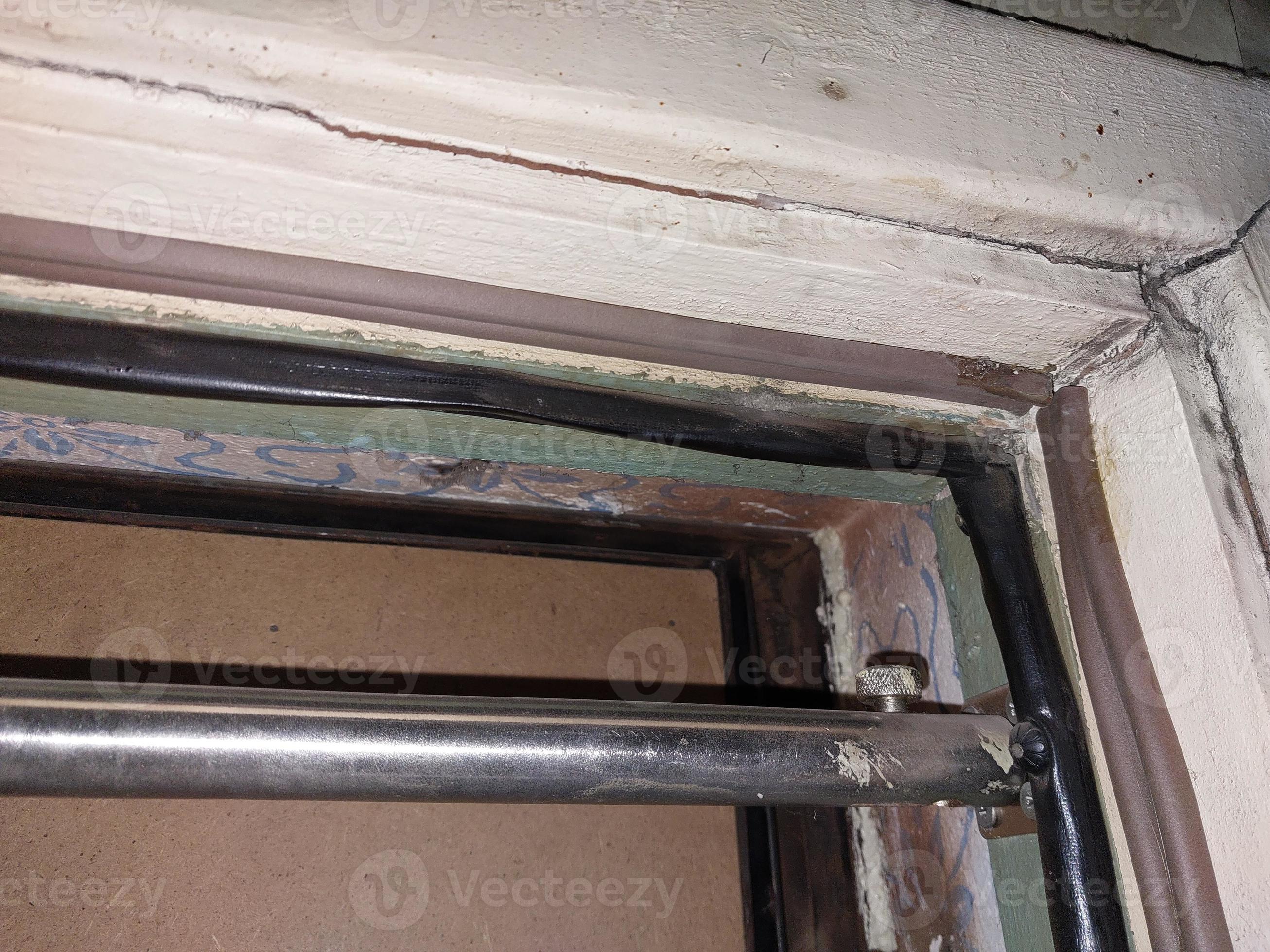 Installing a door seal against drafts and odors 18844970 Stock Photo at