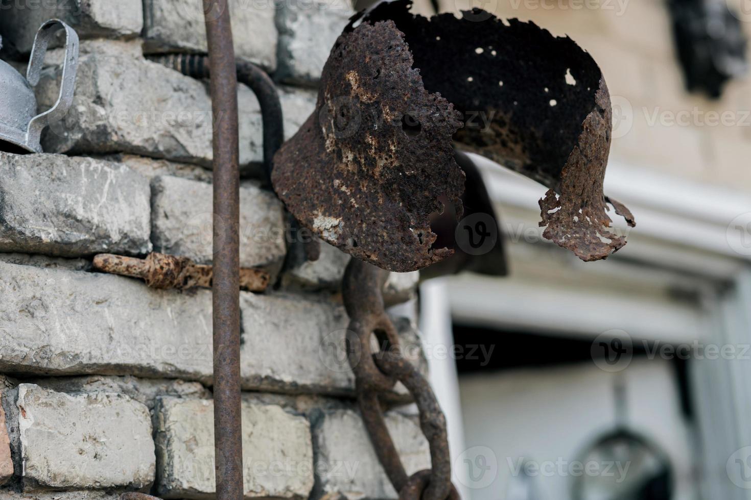 rusty military helmet photo