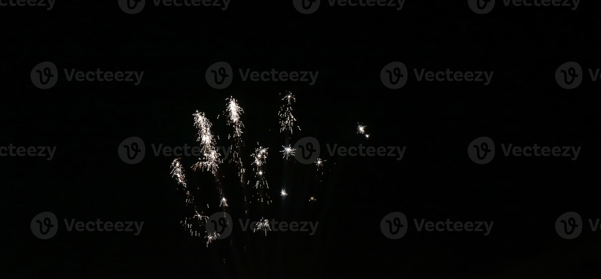 Colorful fireworks on the black sky photo