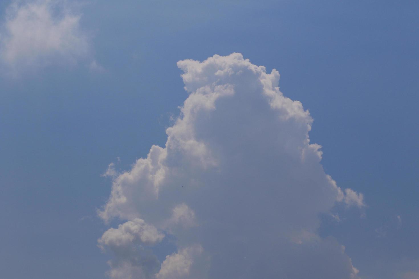 Clear blue sky and white clouds photo