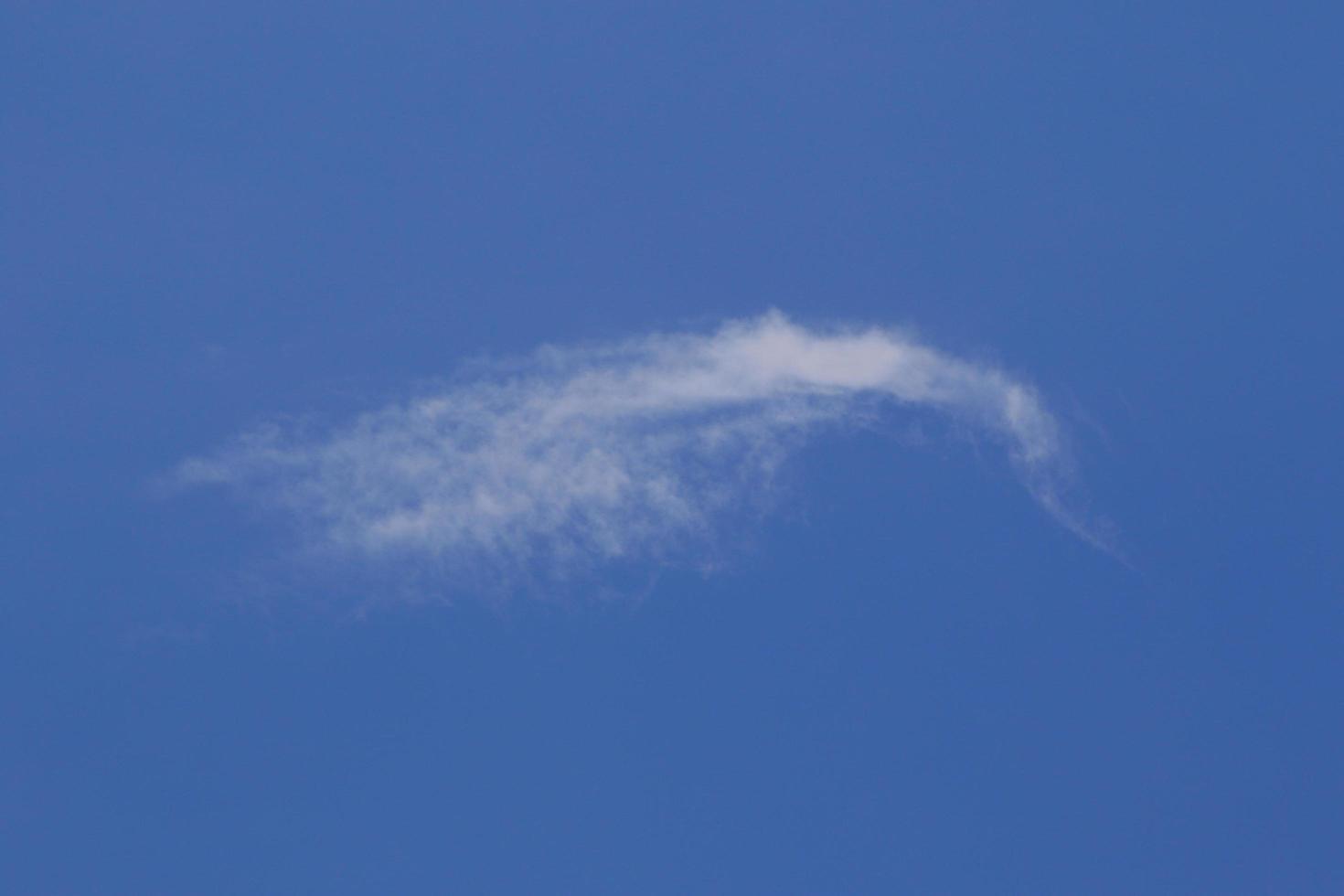 Clear blue sky and white clouds photo