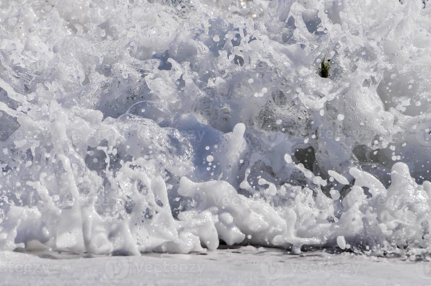 sea foam. splash water photo