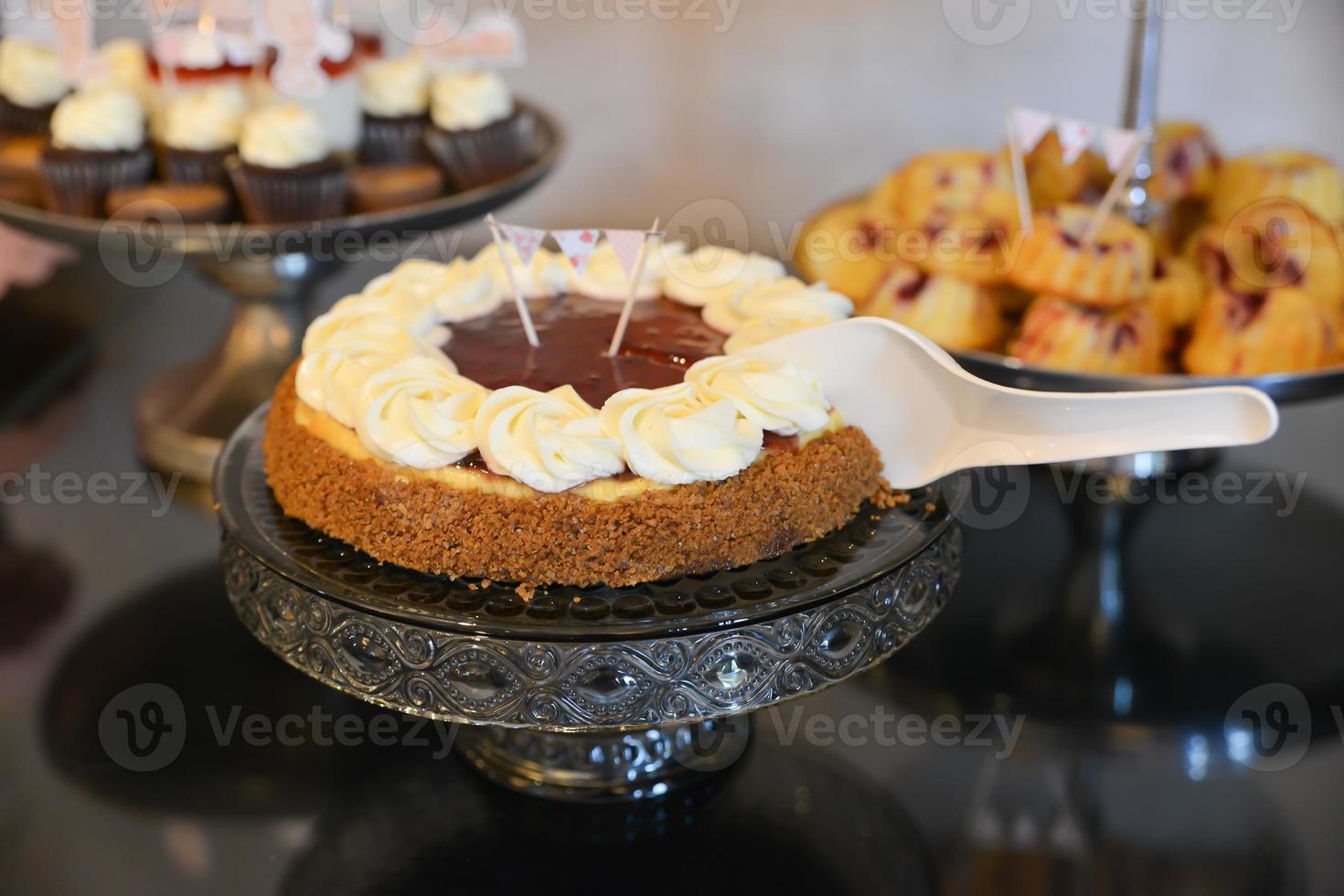 Delicious sweets arranged on the table for events reception photo