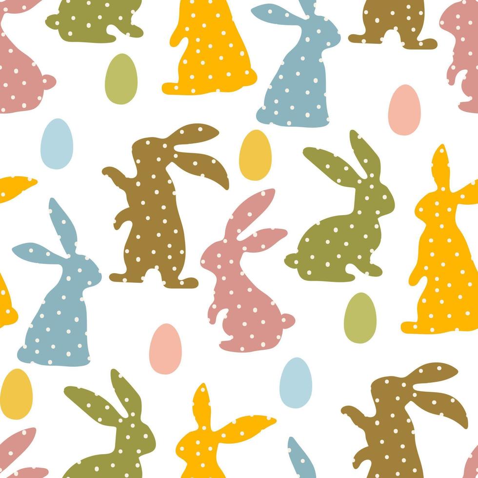 A pattern of Easter bunnies made of polka dot fabric and colored eggs. Rabbit toys for children. Rabbit or hare, a spring festive animal for Easter. Cartoon simple vector character made of fabric.