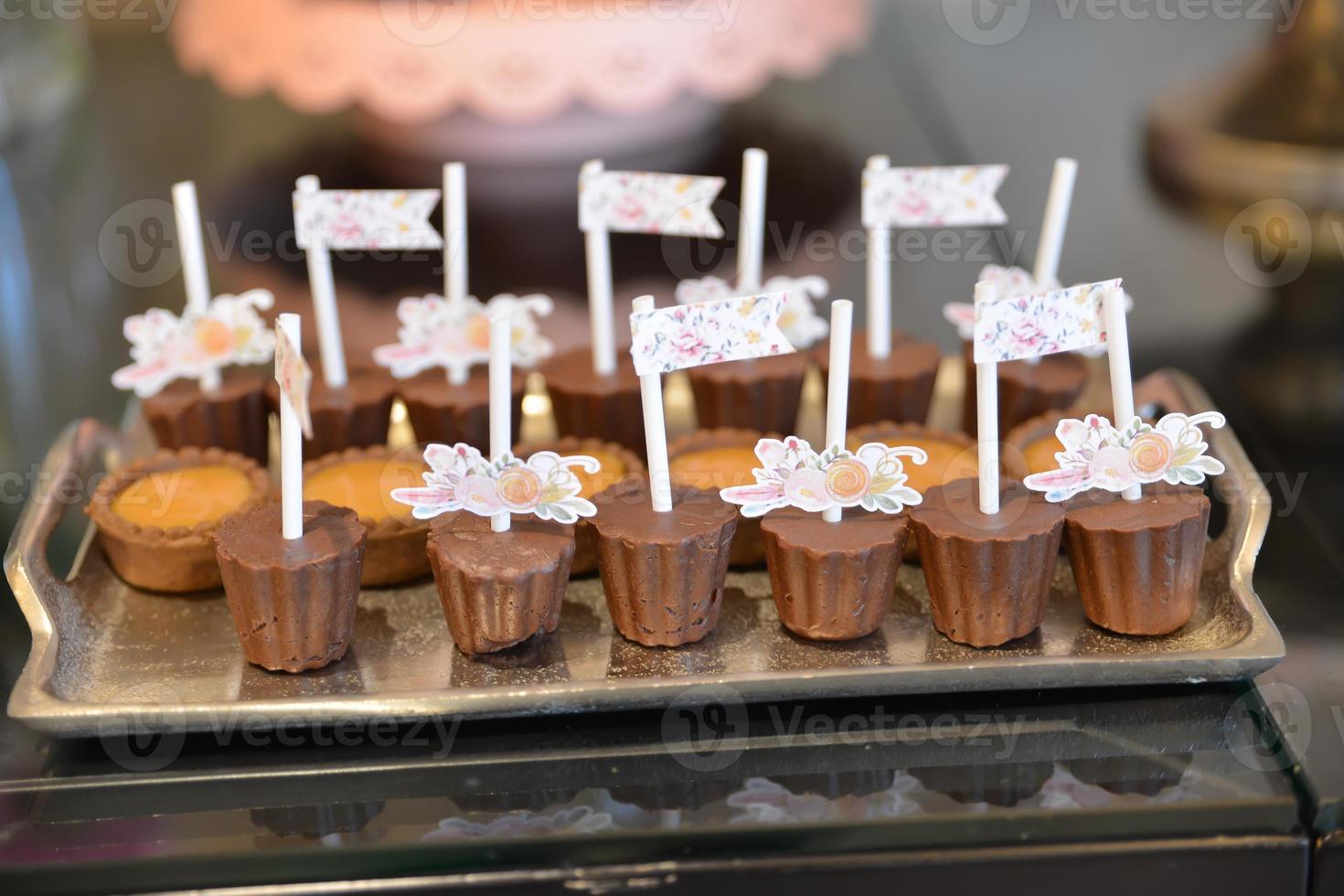 Delicious sweets arranged on the table for events reception photo