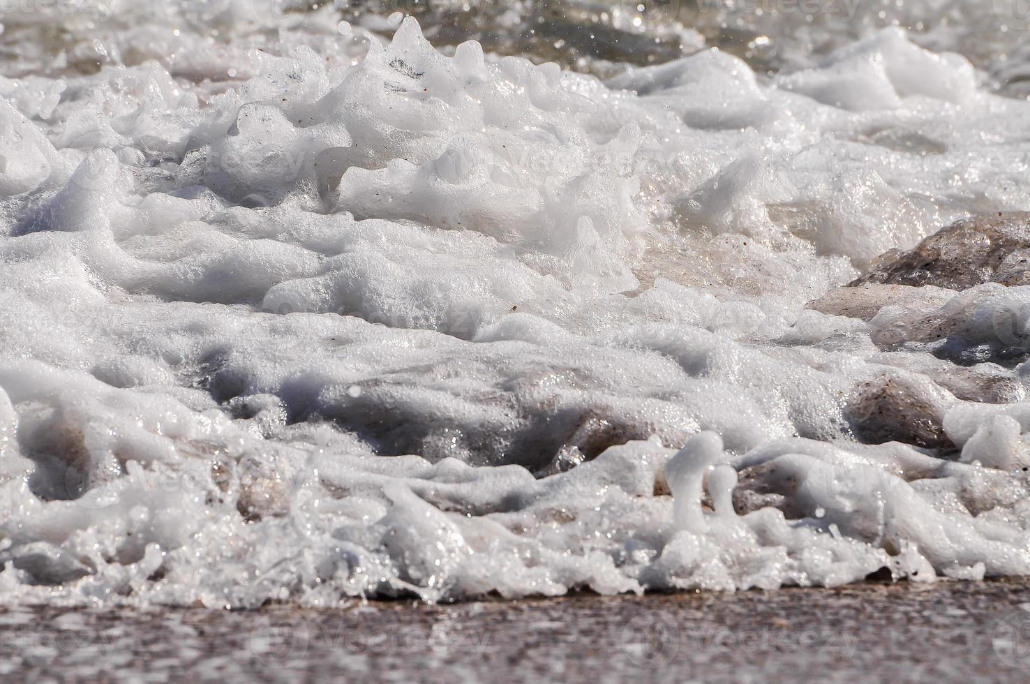 sea foam. splash water photo