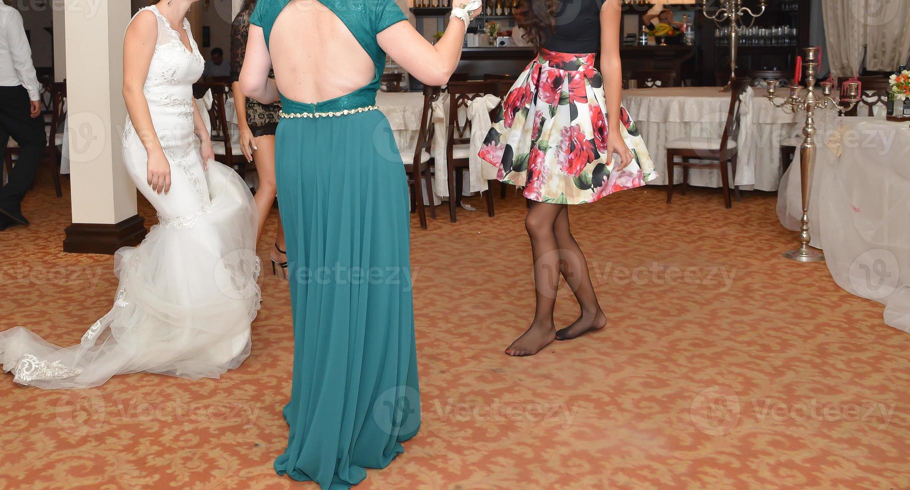 people are dancing at the wedding party photo