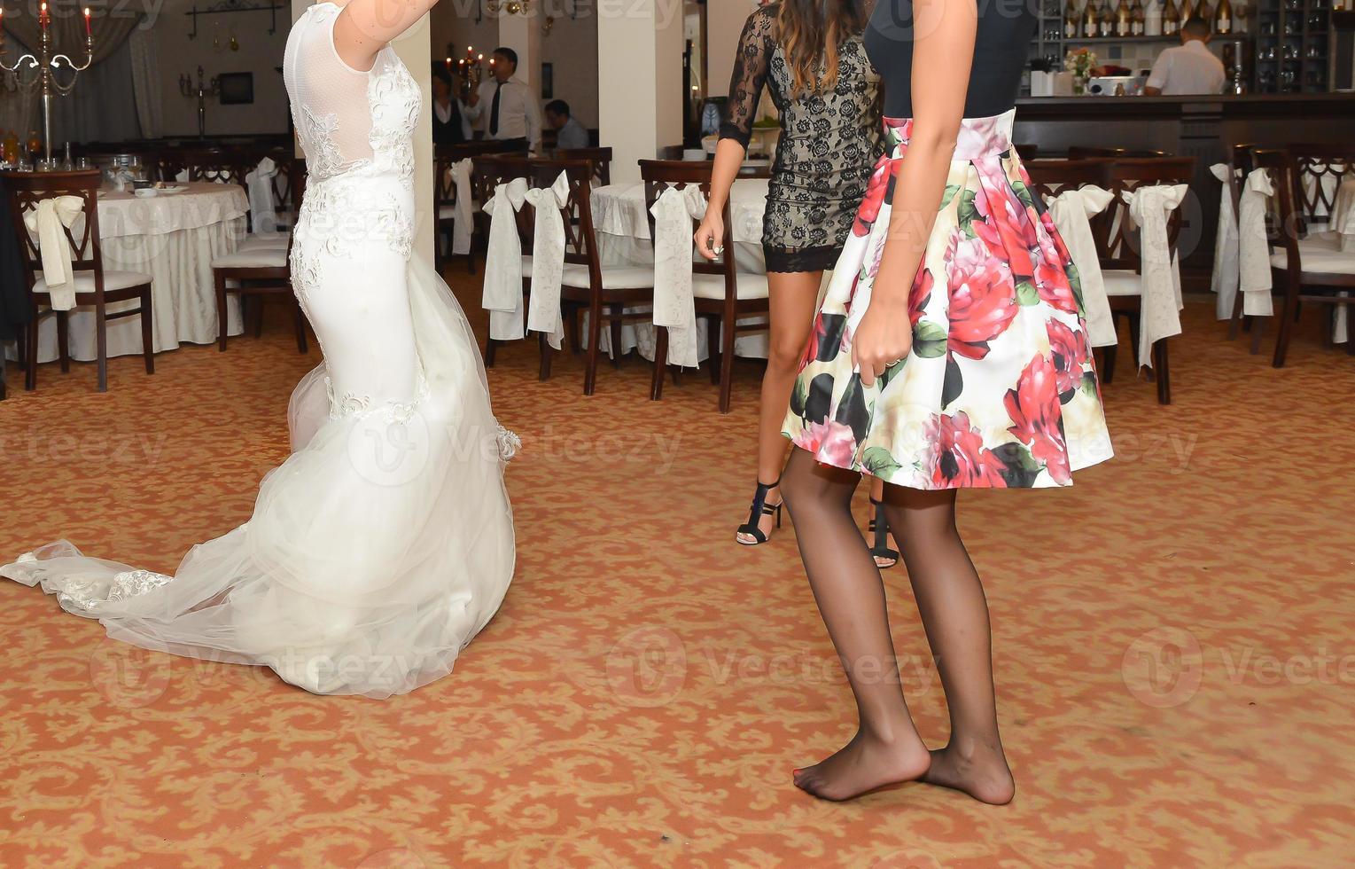 people are dancing at the wedding party photo