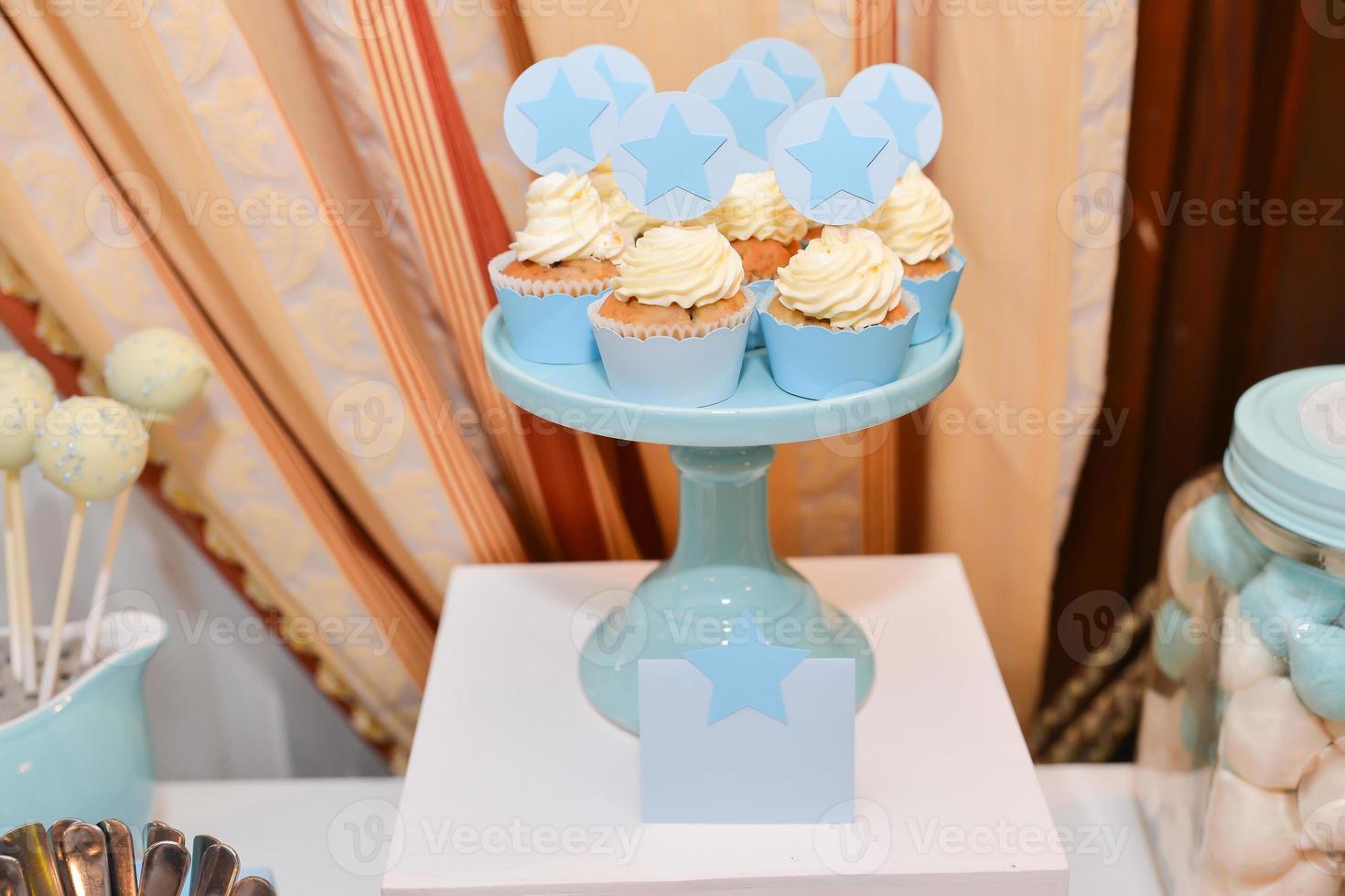 delicious sweets arranged on the table for event reception photo