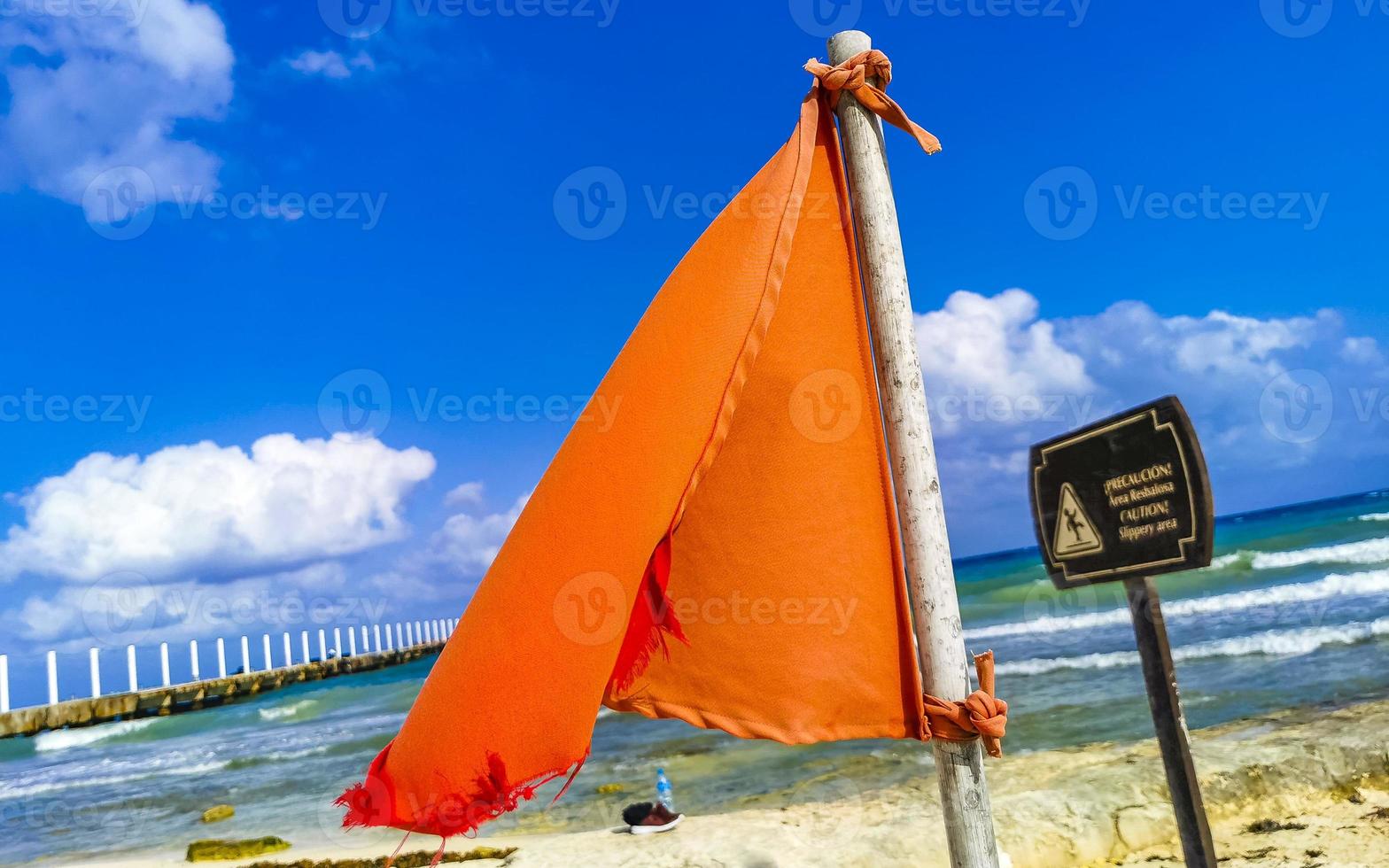 Red flag swimming prohibited high waves Playa del Carmen Mexico. photo