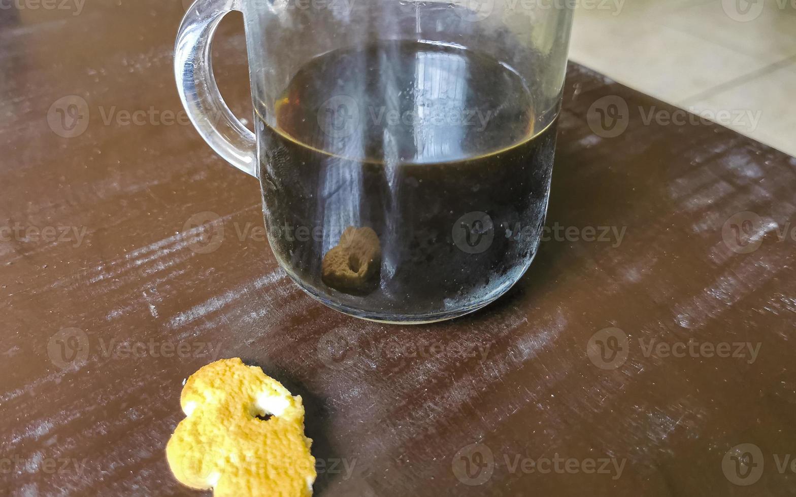 Coffee and cookies on wooden table in Mexico. photo