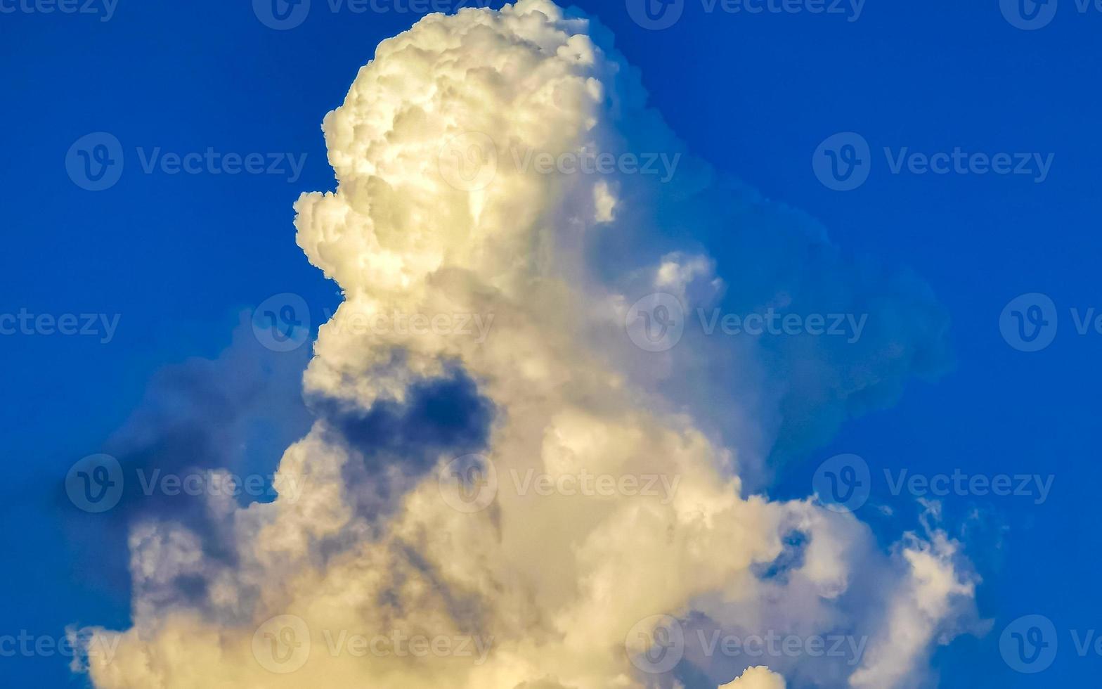 Explosive cloud formation cumulus clouds in the sky in Mexico. photo