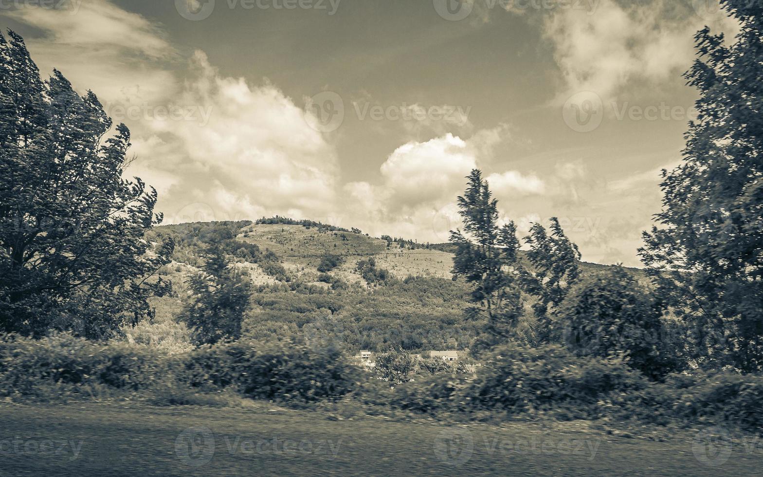 Natural landscape mountains hills and agricultural areas while driving Croatia. photo