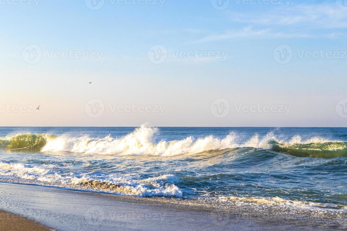 Extremely huge big surfer waves at beach Puerto Escondido Mexico. photo