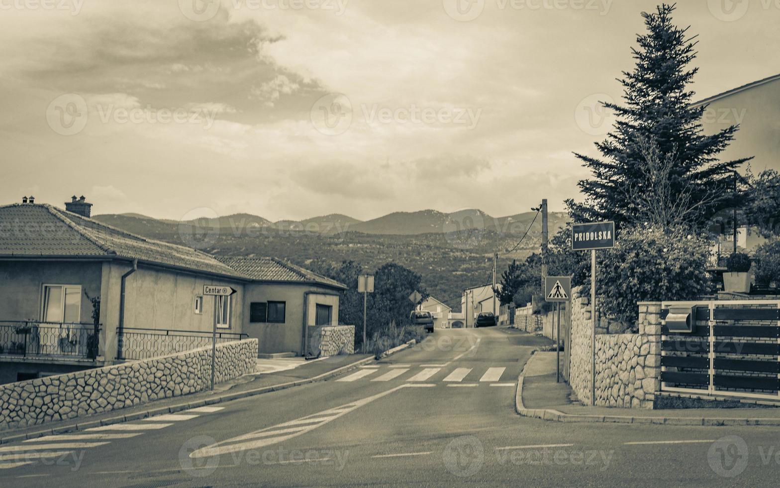 Novi Vinodolski cityscape road and mountains view in beautiful croatia. photo