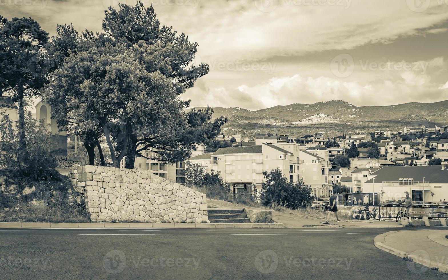 Novi Vinodolski cityscape road and mountains view in beautiful croatia. photo