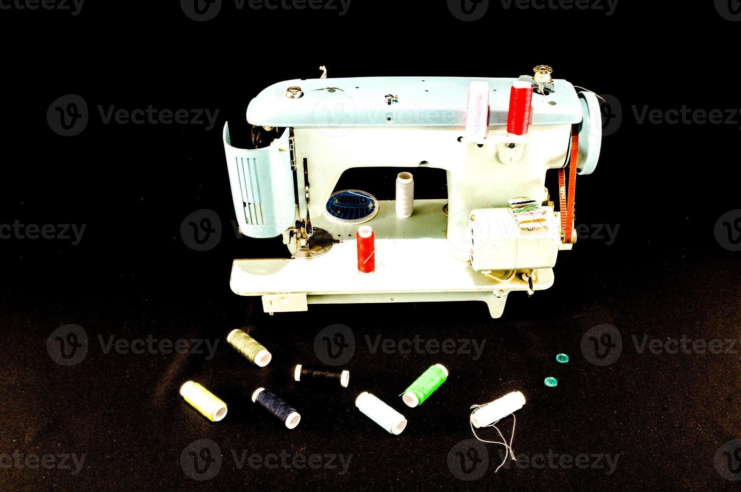 Sewing machine on black background 18854946 Stock Photo at Vecteezy