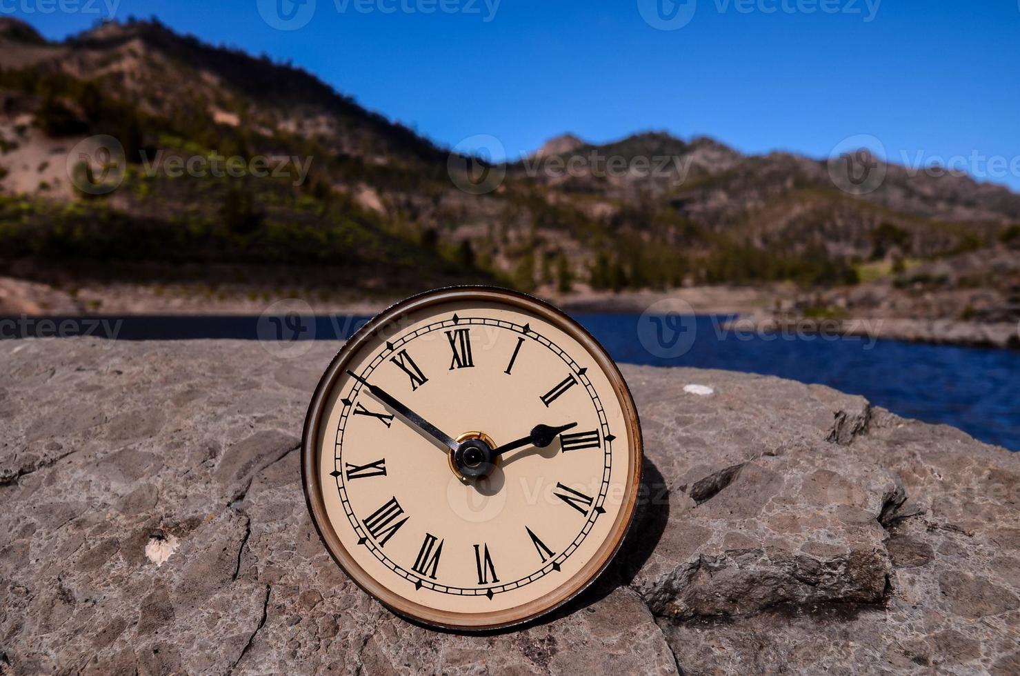 Clock on the ground photo