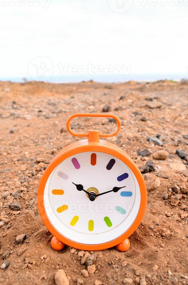 Clock on the ground photo