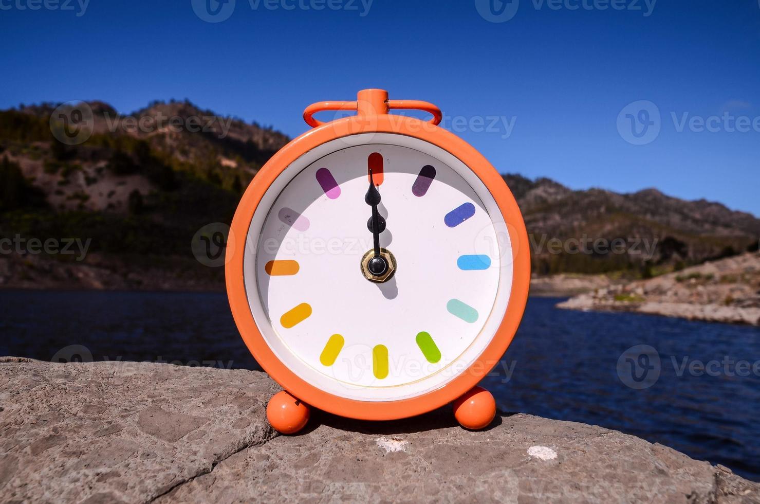 Clock on a rock photo