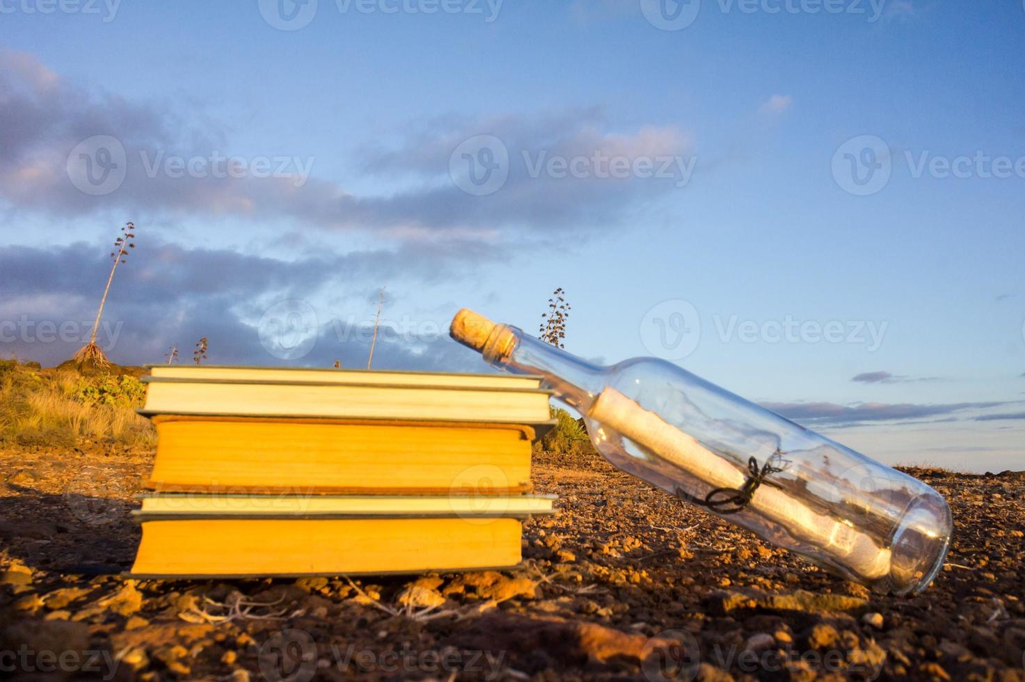 Books and a bottle photo