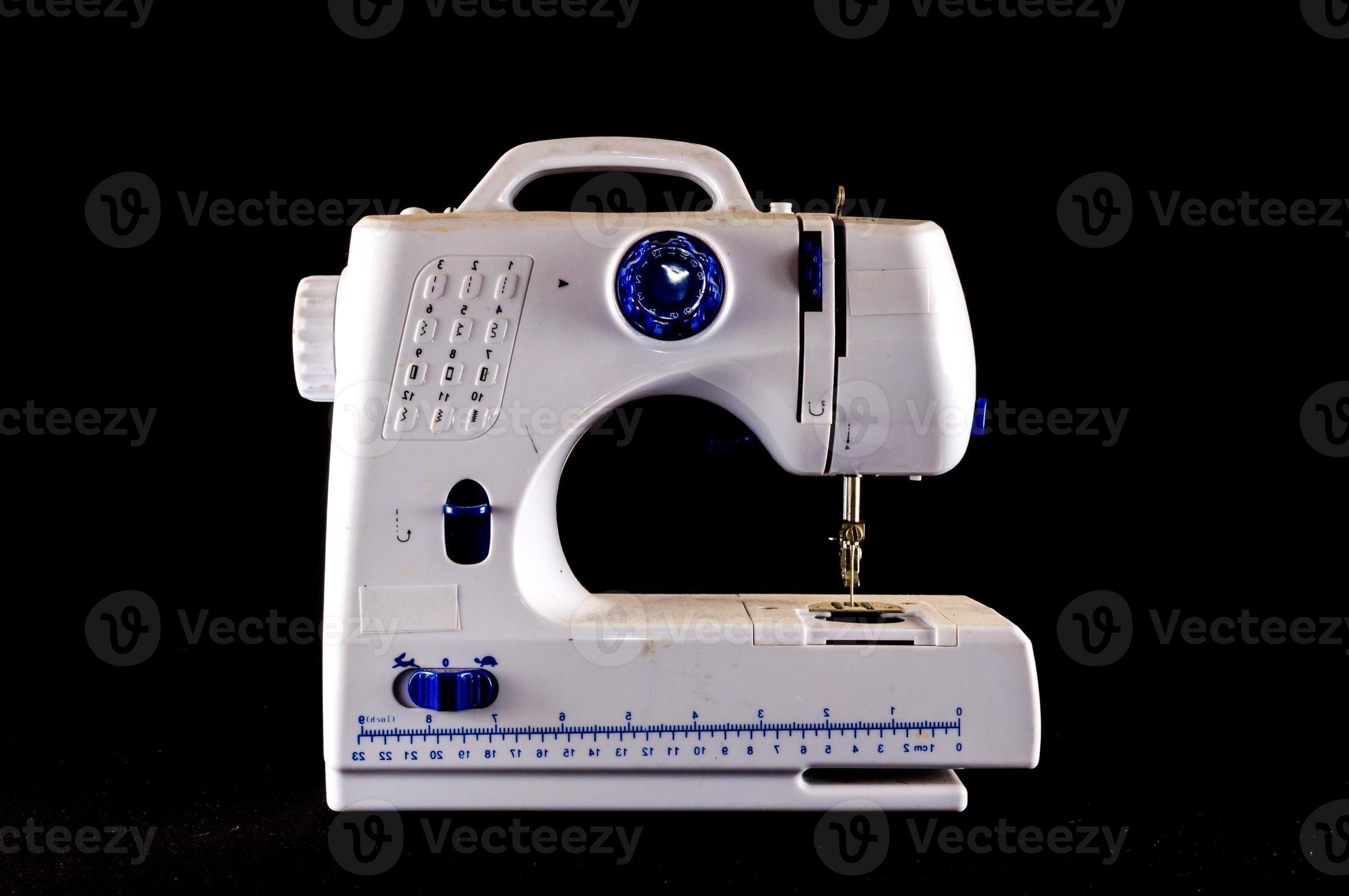 Sewing machine on black background 18855634 Stock Photo at Vecteezy