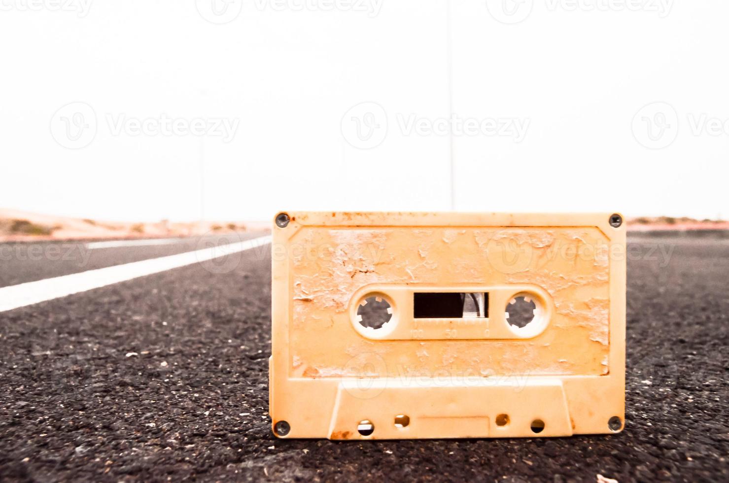 Old casette tape on the road photo