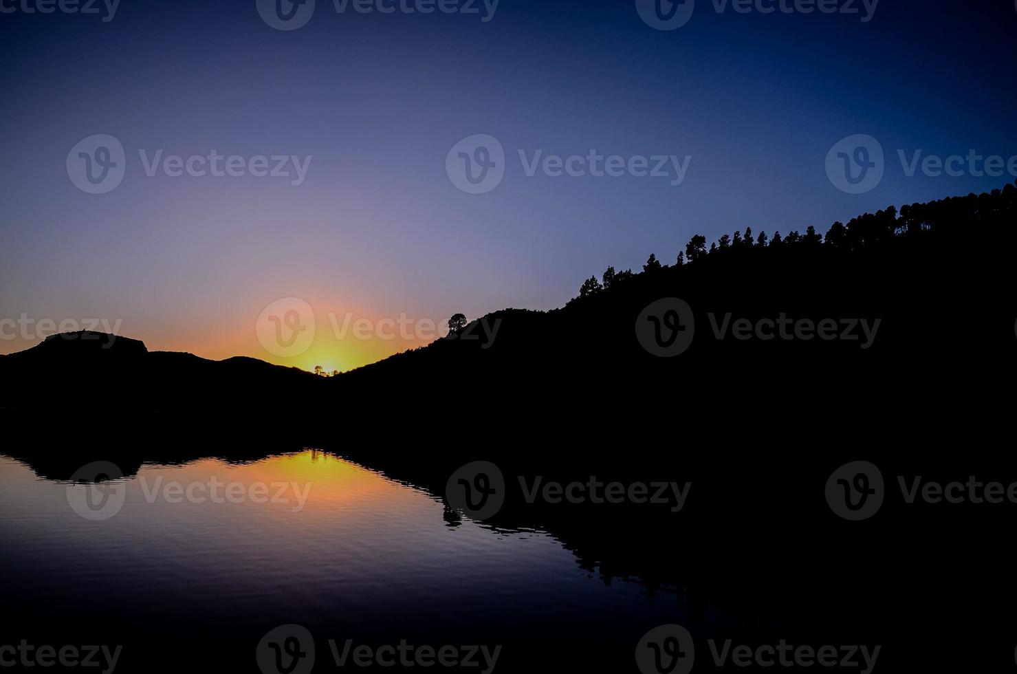 Landscape over the sunset photo