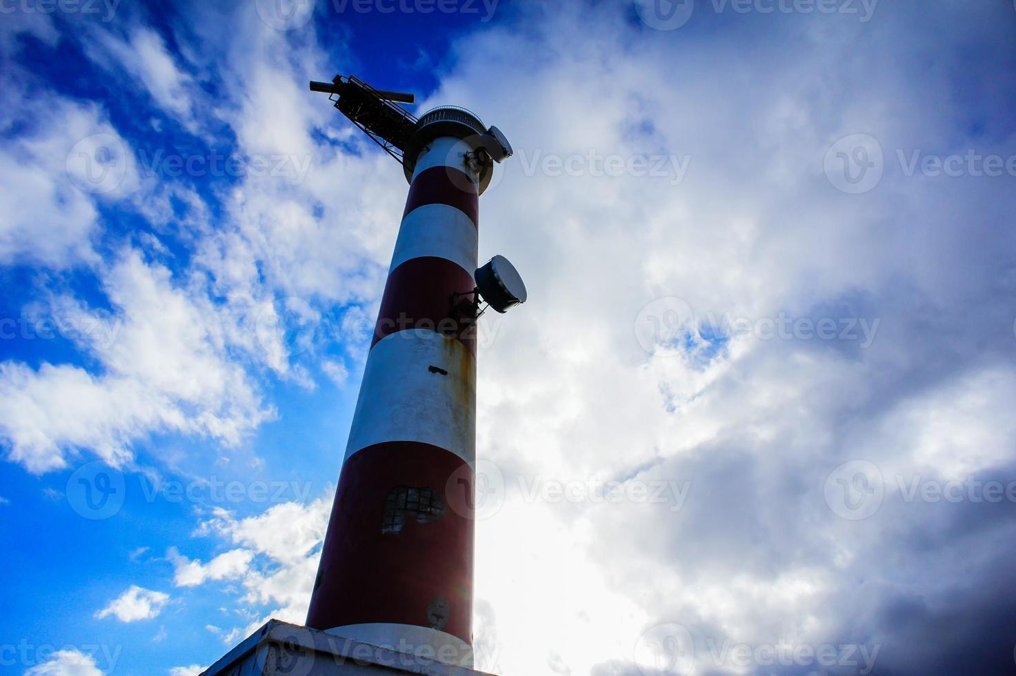 Lighthouse by the sea photo